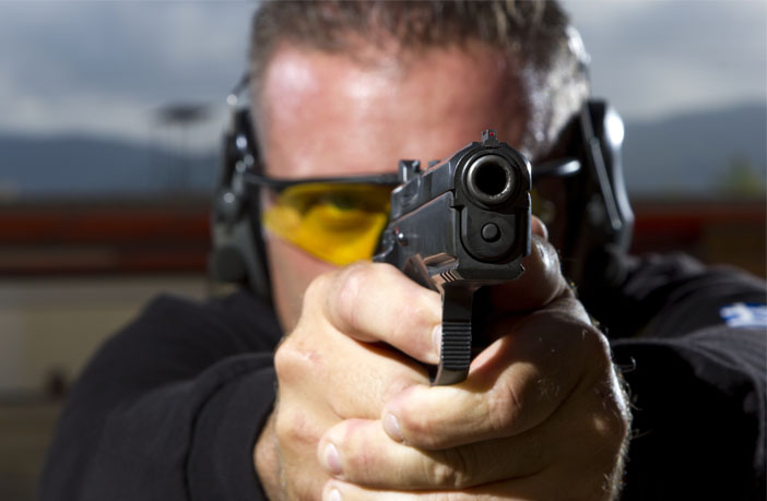 Man-shooting-on-an-outdoor-gun-range.jpg