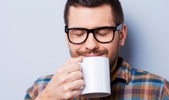 Coffee can help people have a more favorable view of their colleagues, according to new research