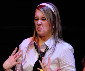 Young woman expressing disgust by Len Radin